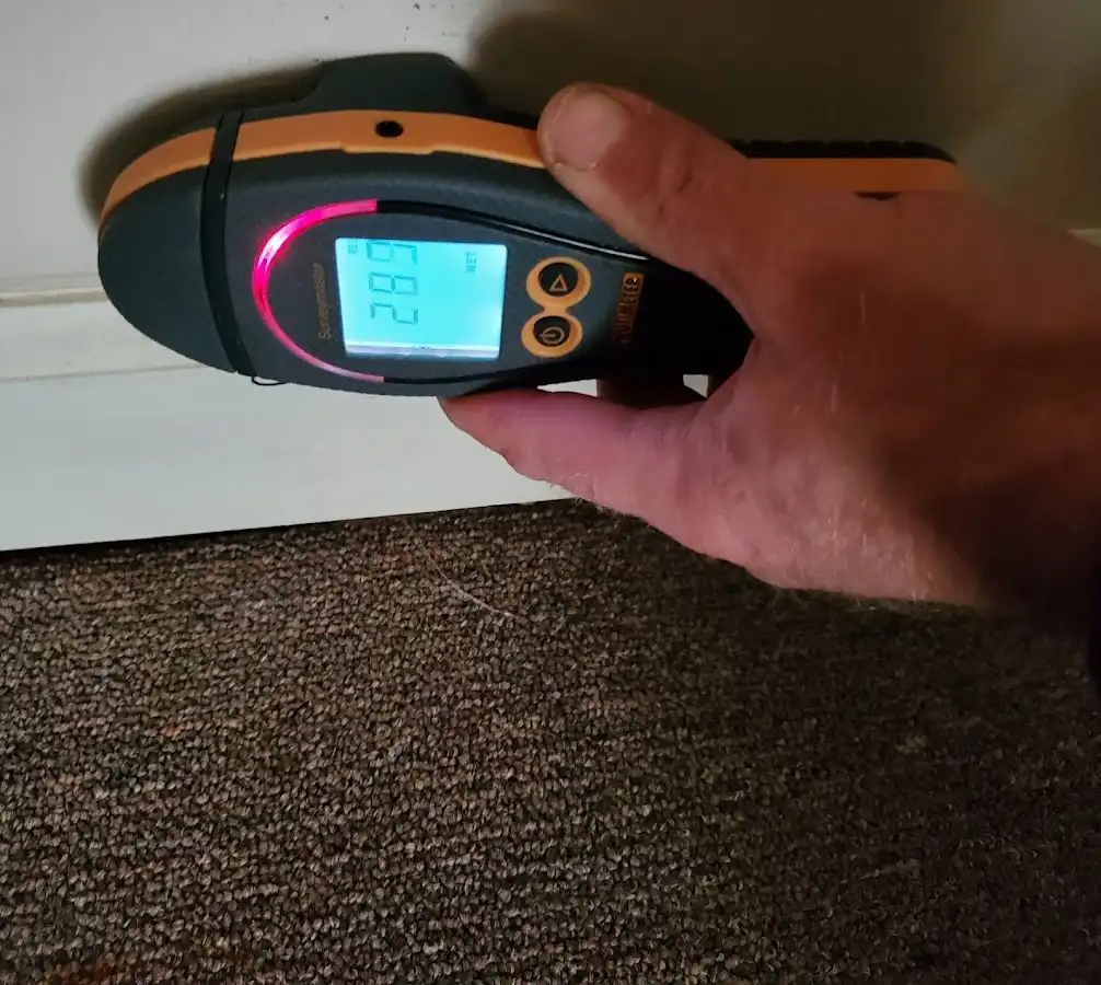 Moisture detection at baseboard during Mold Inspection & Testing in Bessemer City